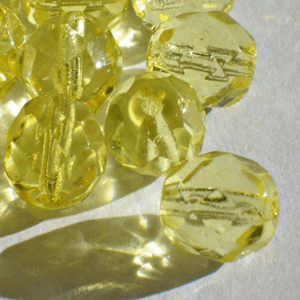 Jonquil AB – gul 8 mm, facetterad  39 st